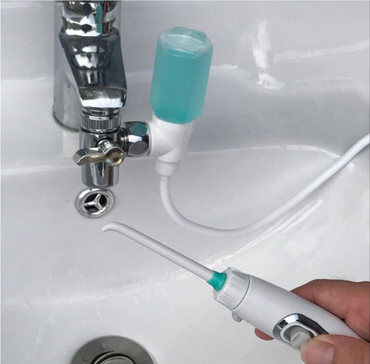 TapFlosser™ - Integrated faucet dental water jet flossing